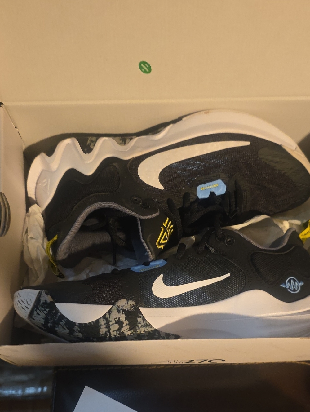 Nike Black and White Running Shoes with Yellow Accents